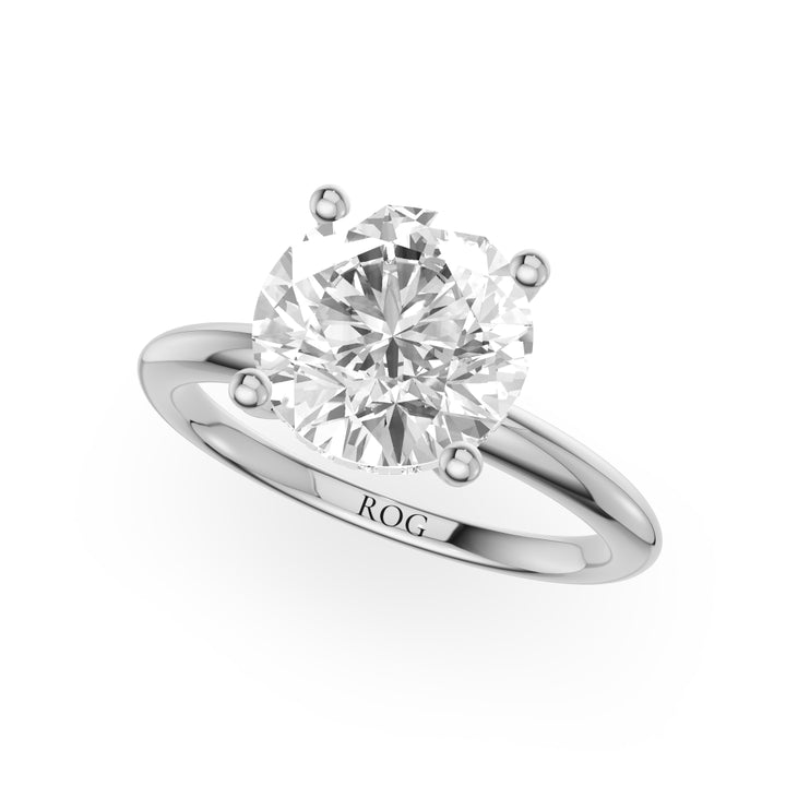 Tübingen Hidden Halo Emerald Engagement Ring