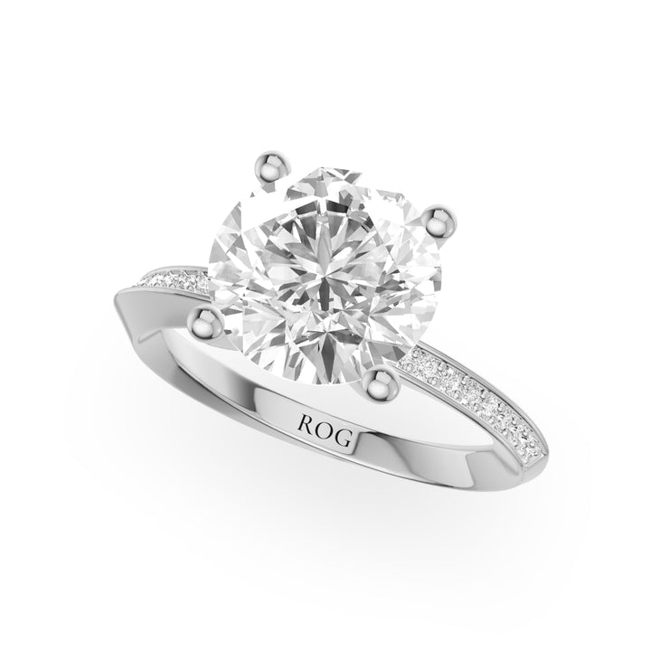 Kiel Bypass-Verlobungsring mit Seitensteinen in 9K Weißgold mit Brilliantem Diamanten